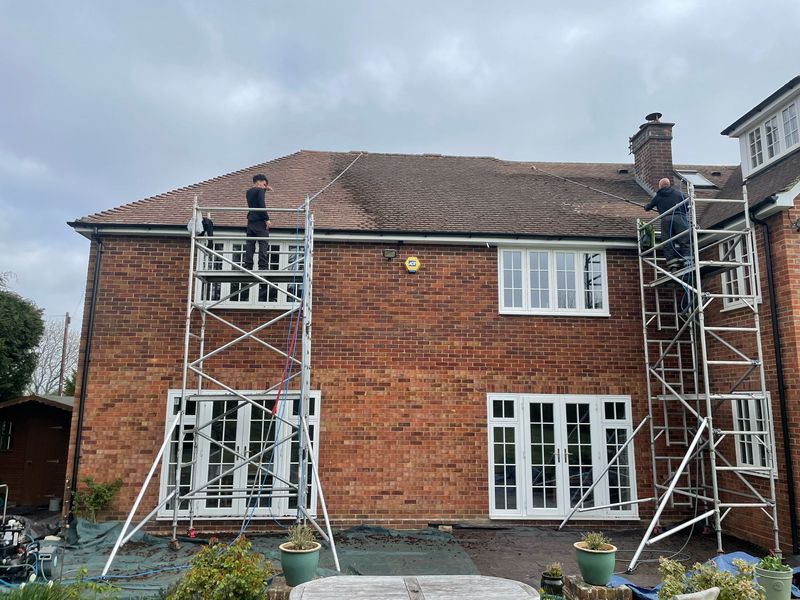 Roof cleaning carried out safely from scaffold towers by The Roof Moss Cleaners in Yate